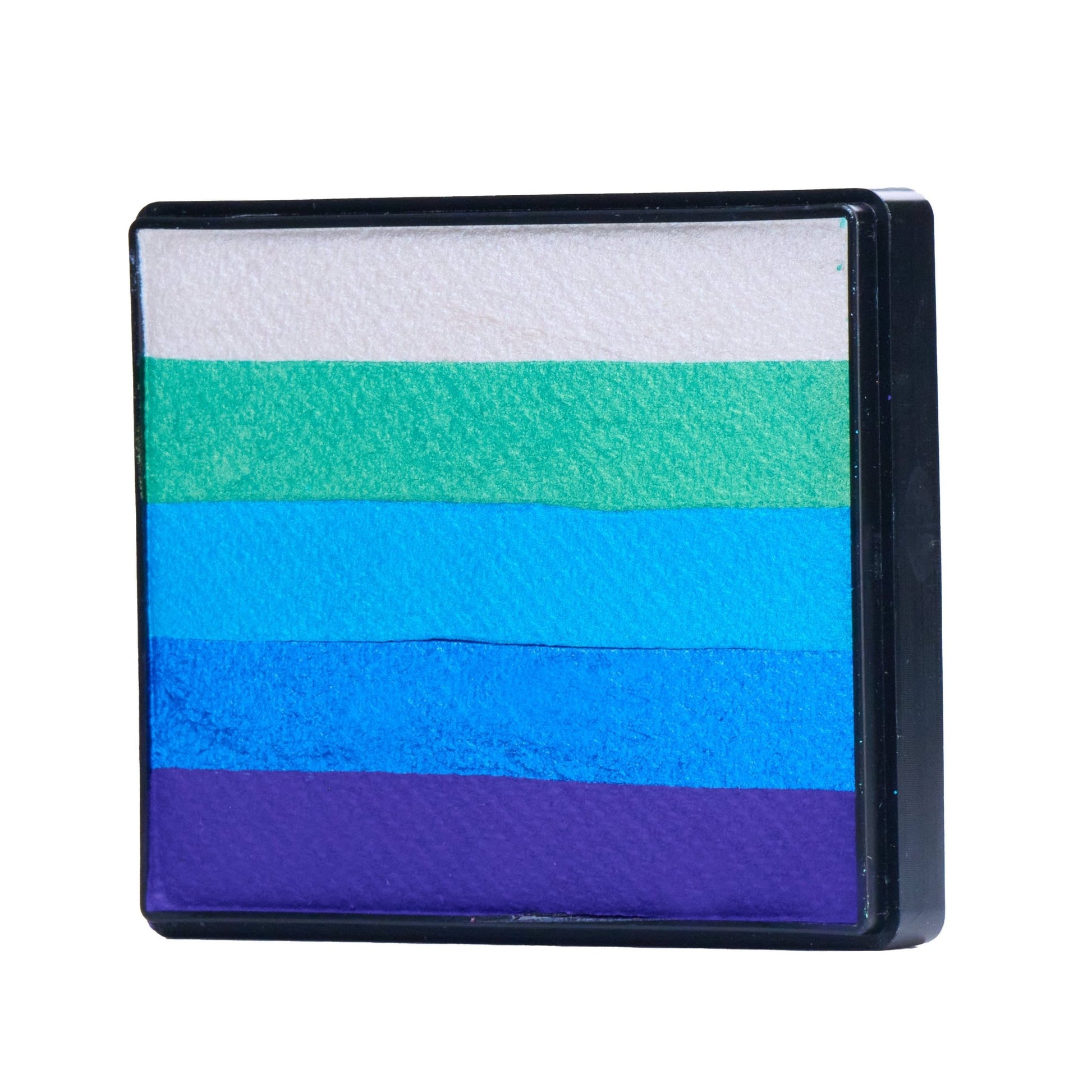 Image of a Rainbow Face Paint Cake featuring a palette of bright colors arranged in stripes. Designed for easy application, this face paint allows artists to create bold, blended, multi-color designs with a single swipe. Ideal for a variety of themes and festive occasions.