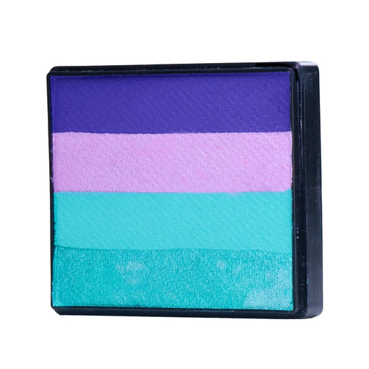 Image of a Rainbow Face Paint Cake featuring a palette of bright colors arranged in stripes. Designed for easy application, this face paint allows artists to create bold, blended, multi-color designs with a single swipe. Ideal for a variety of themes and festive occasions.