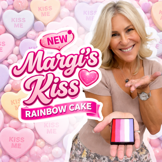 Woman holding a product with 'New Margi's Kiss Rainbow Cake' text and candy heart background