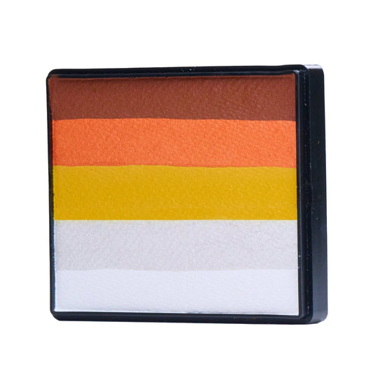 Image of a Rainbow Face Paint Cake featuring a palette of bright colors arranged in stripes. Designed for easy application, this face paint allows artists to create bold, blended, multi-color designs with a single swipe. Ideal for a variety of themes and festive occasions.