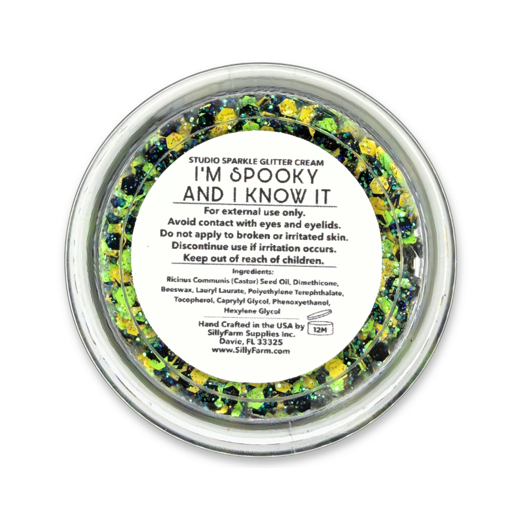 Close-up of I’m Spooky and I Know It Glitter Cream with bright green, yellow, black, and iridescent glitter.