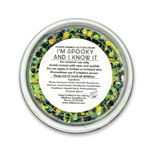 Close-up of I’m Spooky and I Know It Glitter Cream with bright green, yellow, black, and iridescent glitter.