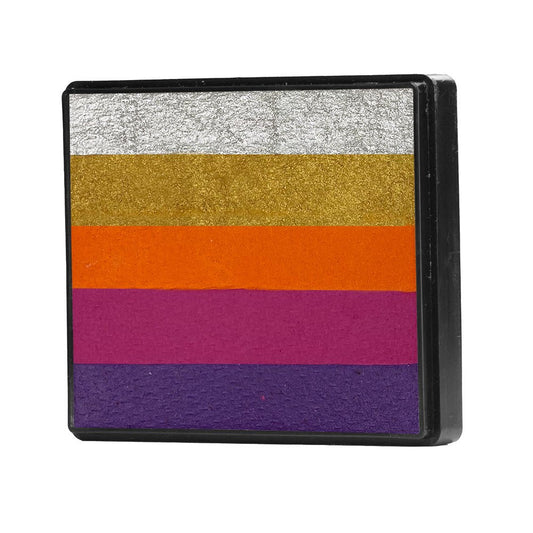 Image of a Rainbow Face Paint Cake featuring a palette of bright colors arranged in stripes. Designed for easy application, this face paint allows artists to create bold, blended, multi-color designs with a single swipe. Ideal for a variety of themes and festive occasions.