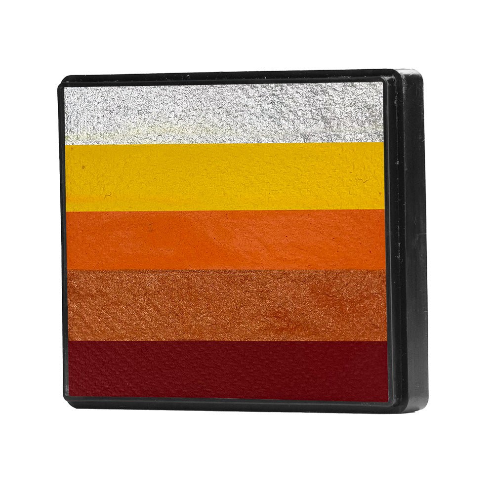 Image of a Rainbow Face Paint Cake featuring a palette of bright colors arranged in stripes. Designed for easy application, this face paint allows artists to create bold, blended, multi-color designs with a single swipe. Ideal for a variety of themes and festive occasions.