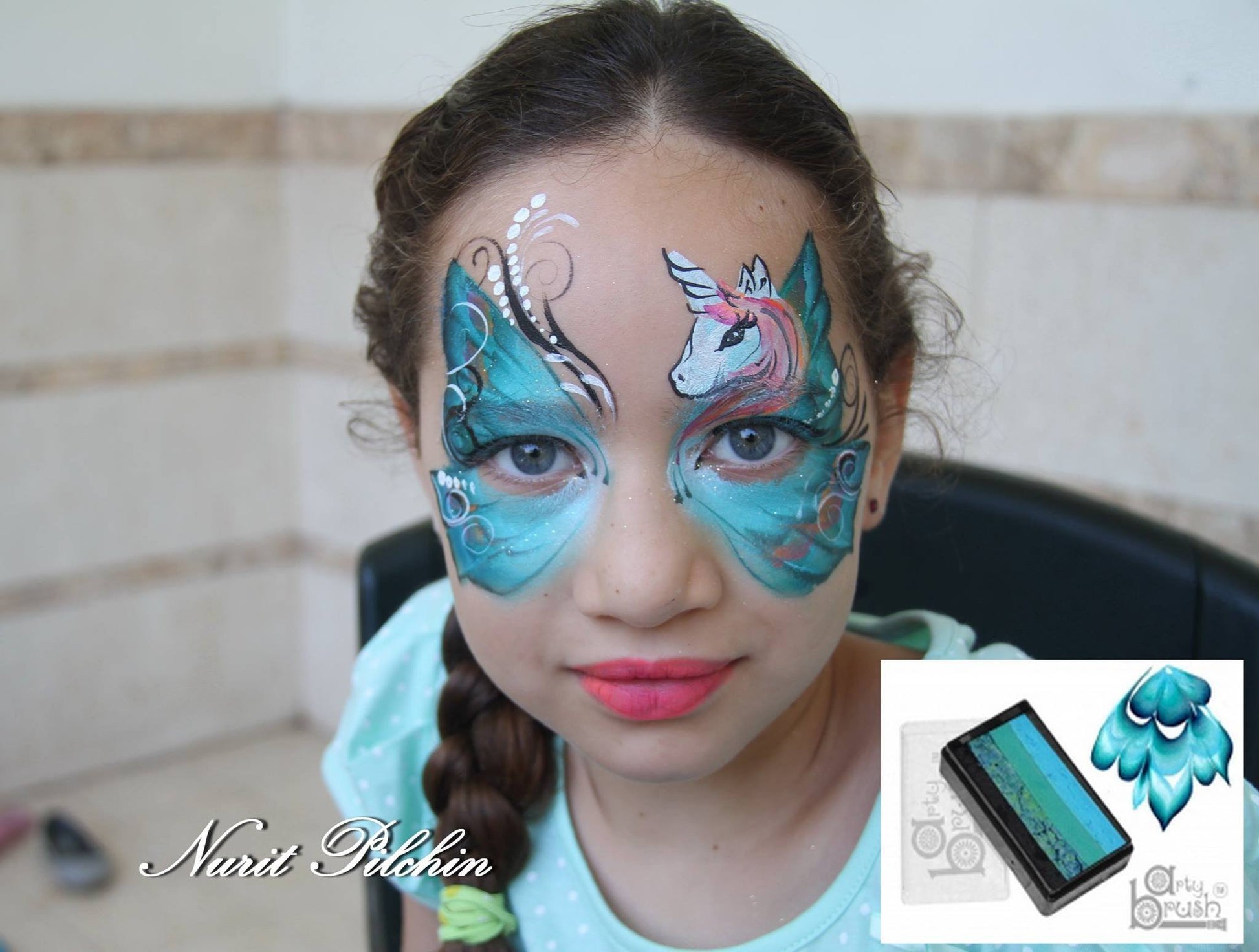 Face paint design using Arty Cakes, showing bold, multi-color effects in one stroke for dynamic face and body art.
