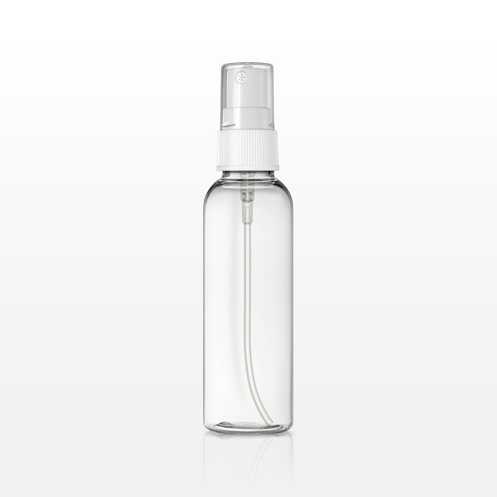 Clear cylindrical 2 oz spray mist bottle with a white spray pump and transparent cap, shown standing upright against a light gray background. The bottle is empty, highlighting the internal spray tube and compact travel-friendly design.