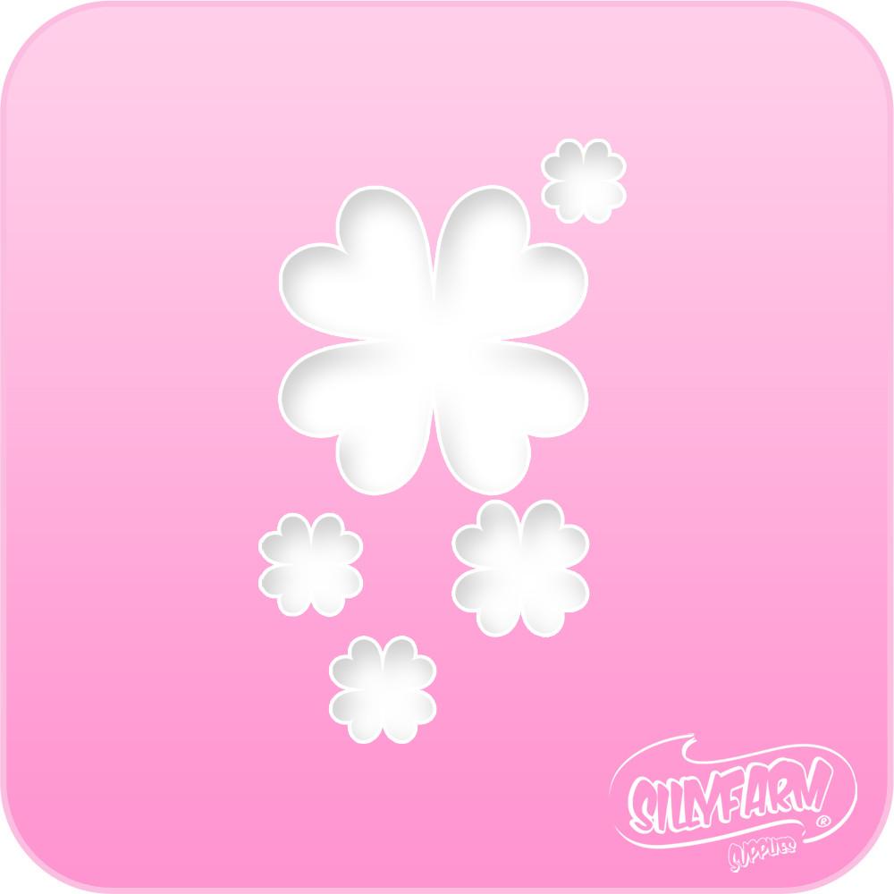 Pink Power stencil featuring a large four-leaf clover surrounded by smaller clovers, cut from hot pink Mylar.