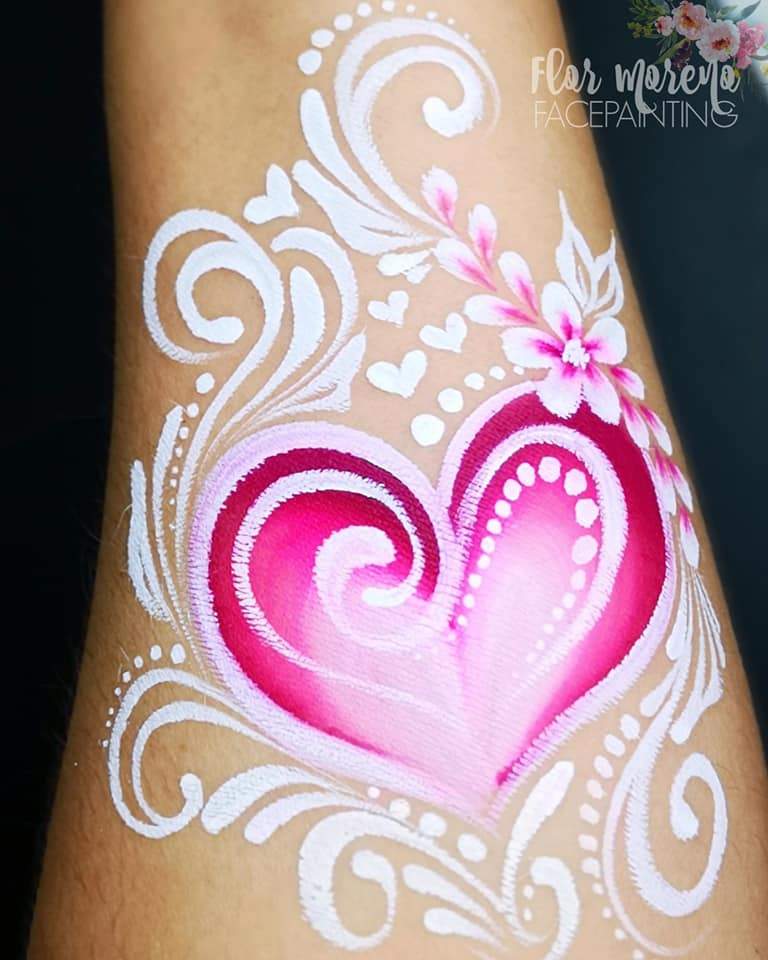 Body paint design using Arty Cakes, showing bold, multi-color effects in one stroke for dynamic face and body art