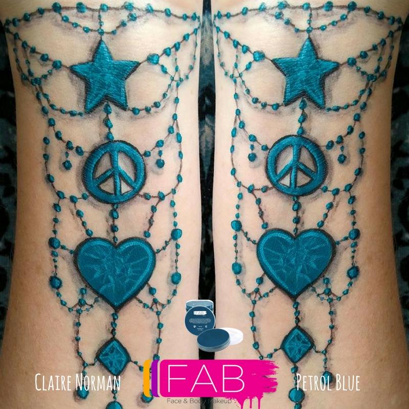 Body painted with vibrant, smudge-proof FAB paint, known for smooth, creamy coverage. Ideal for detailed face art