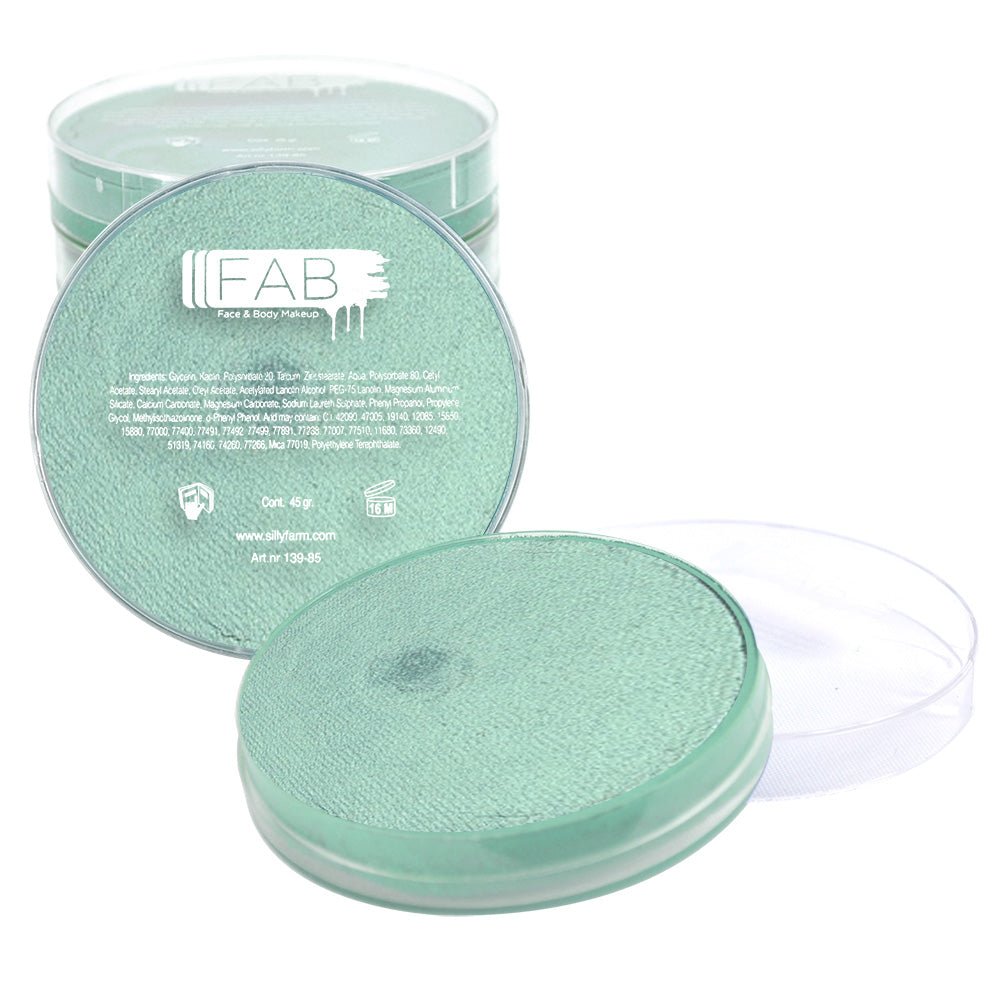 photo shows a round plastic container of FAB Makeup Seashell Shimmer face paint with antique mint shimmer shade visible inside.