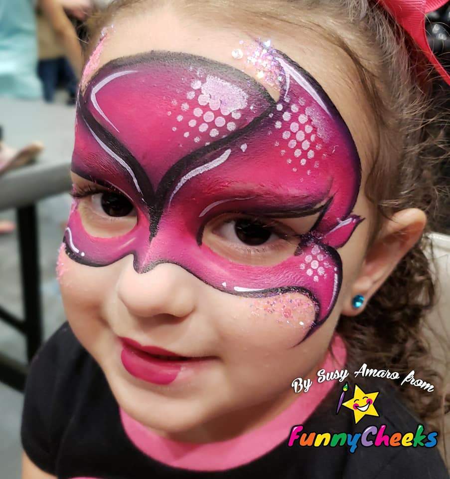 Face paint design using Arty Cakes, showing bold, multi-color effects in one stroke for dynamic face and body art