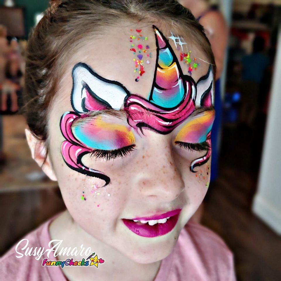 Face paint design using Arty Cakes, showing bold, multi-color effects in one stroke for dynamic face and body art