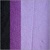 Compact, multi-color face paint cakes for brush application, ideal for vibrant, detailed designs in one stroke.