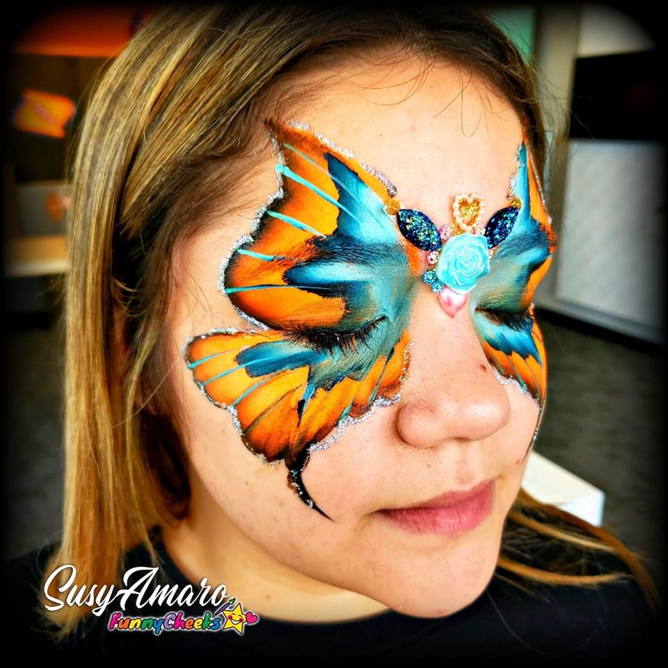 Face paint design using Arty Cakes, showing bold, multi-color effects in one stroke for dynamic face and body art