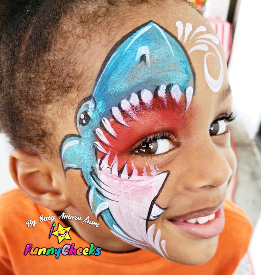 Face paint design using Arty Cakes, showing bold, multi-color effects in one stroke for dynamic face and body art
