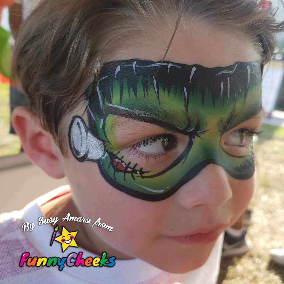 Face paint design using Arty Cakes, showing bold, multi-color effects in one stroke for dynamic face and body art