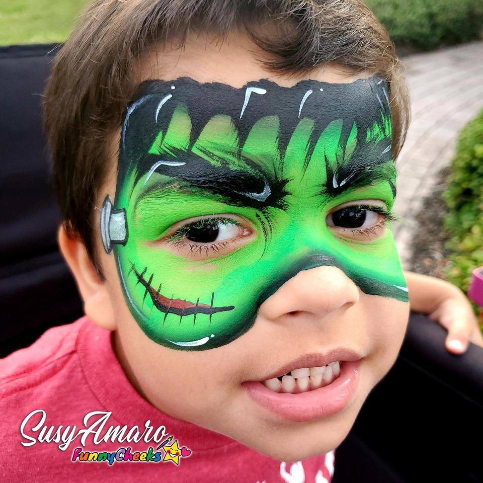 Face paint design using Arty Cakes, showing bold, multi-color effects in one stroke for dynamic face and body art